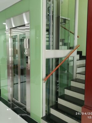 lắp đặt thang máy cửa kính
